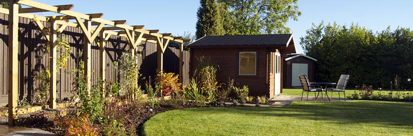 The flower bed and pergola in this Earl Shilton garden