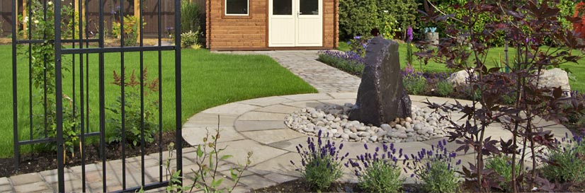 Garden design photo in Earl Shilton with unique water feature